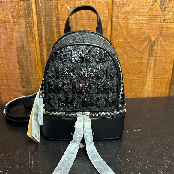 Michael Kors Handbags - Michael Kors Signature Rhea Extra Small Backpack - Black